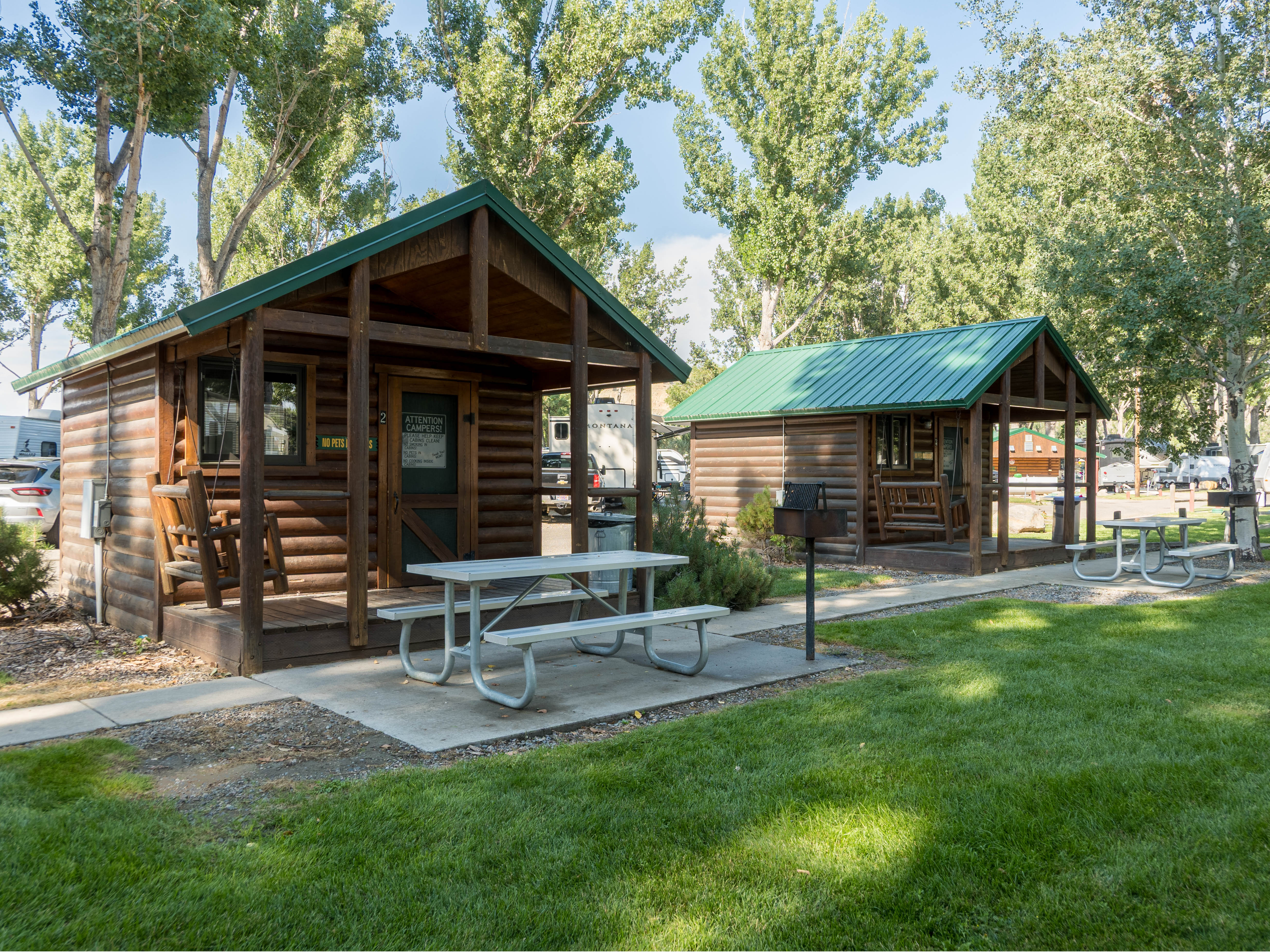 cabins with picnic tables, grill, swing